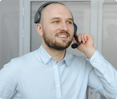 Munroe Dairy customer service representative on a headset